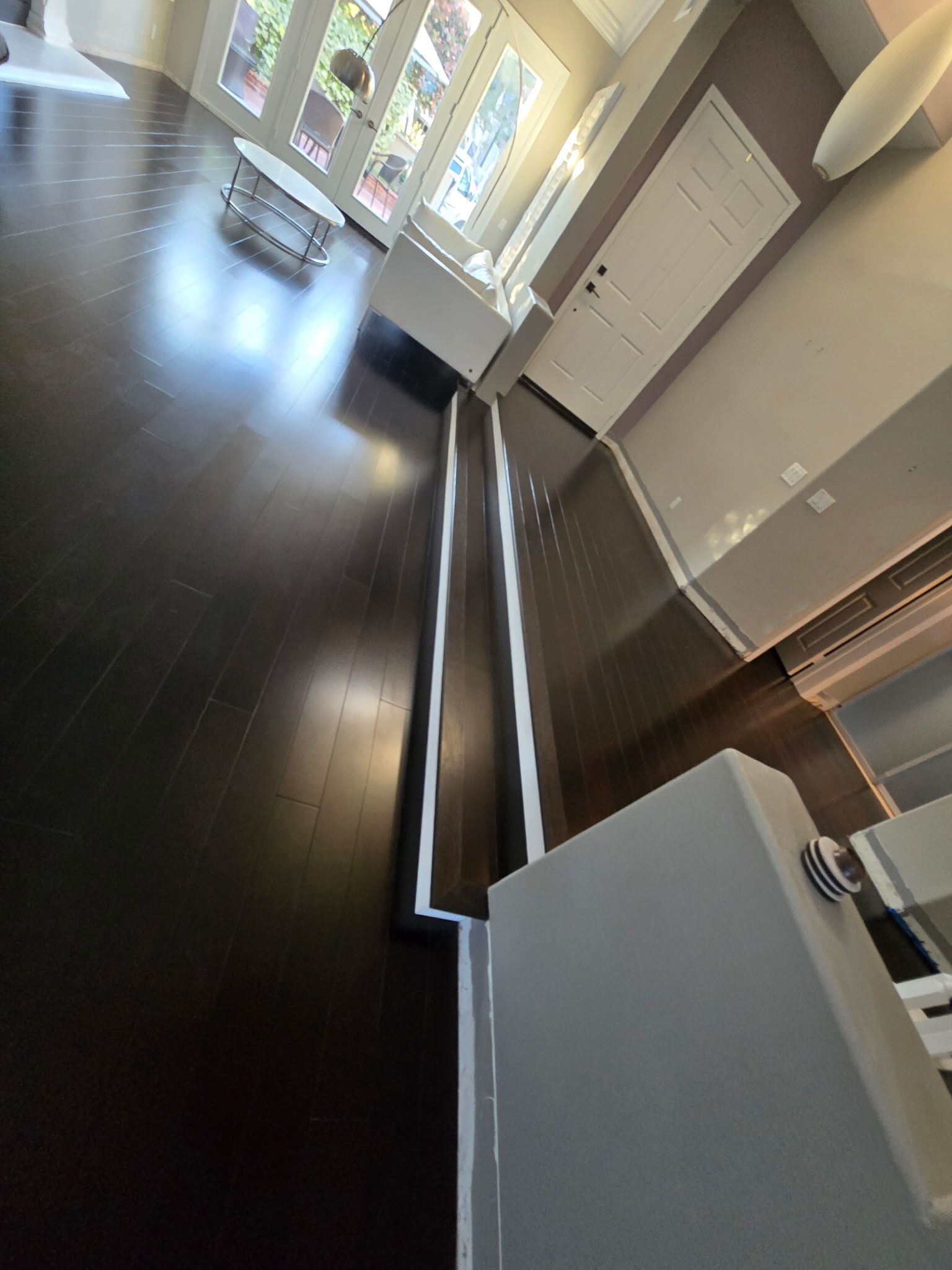 Entryway transition flooring project in Orange County