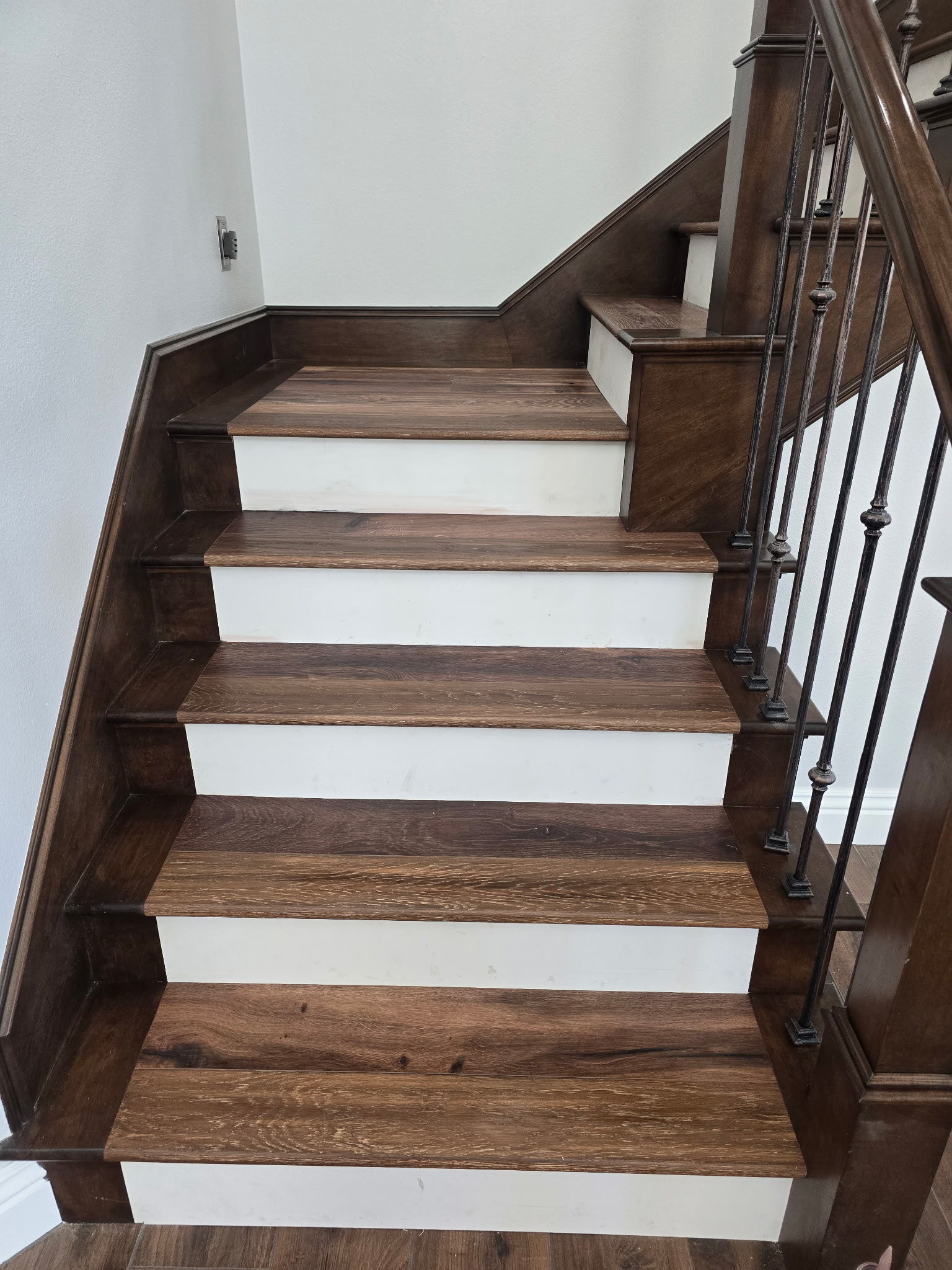 Warm wood landing flooring project in Irvine